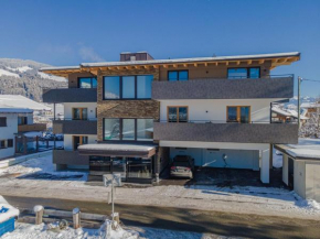 Penthouse with roof terrace and stunning view Brixen Im Thale